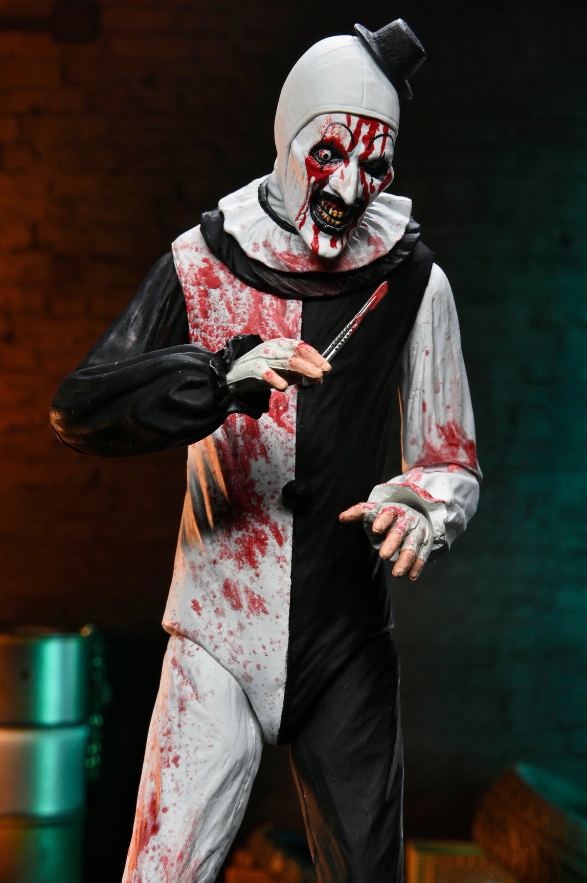 TERRIFIER 2 - ULTIMATE ART THE CLOWN 7" SCALE ACTION FIGURE (BLOOD SPLATTERED)